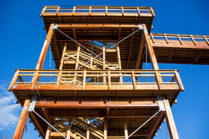 brown wooden tower under blue sky during daytime
